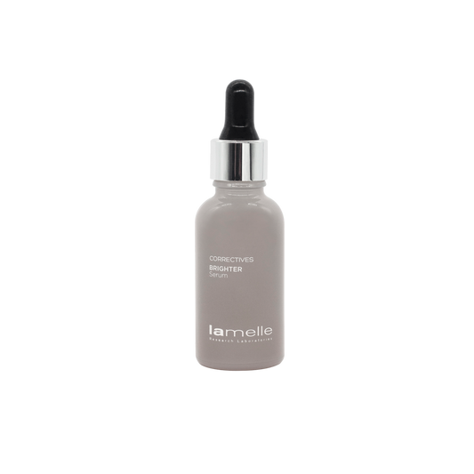 Skincare bottle with dropper labeled 'la melle' on a white background